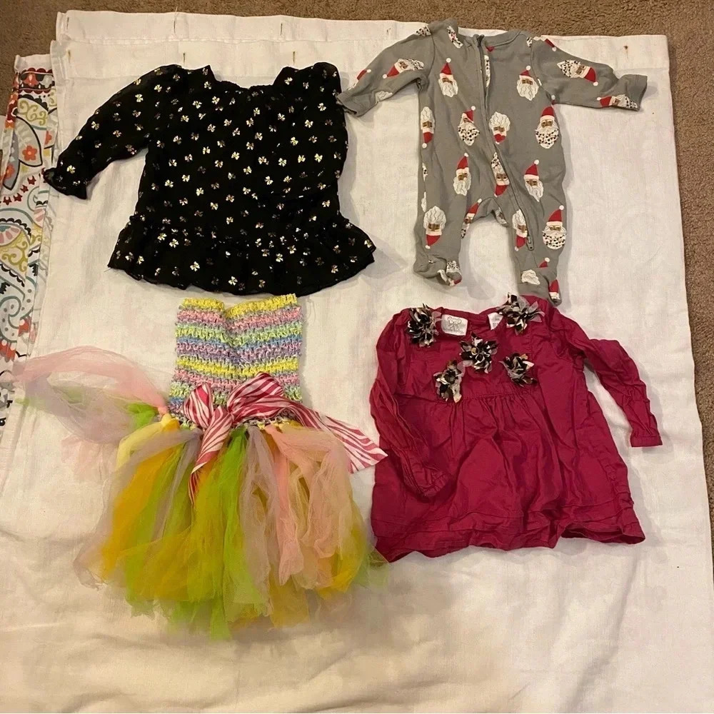 4 pieces bundle of baby girl clothes size 0-9M